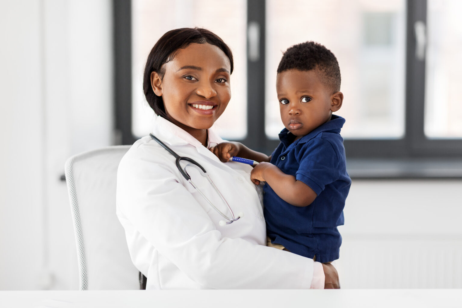 paediatric doctor with a child