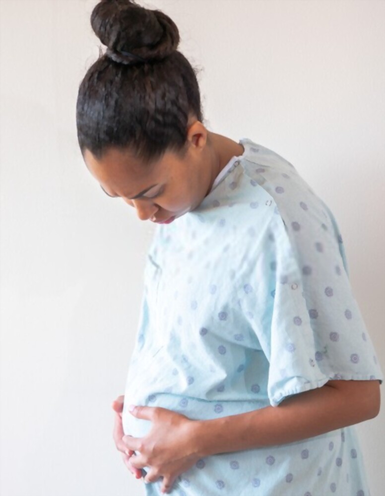 pregnant woman in hospital robe